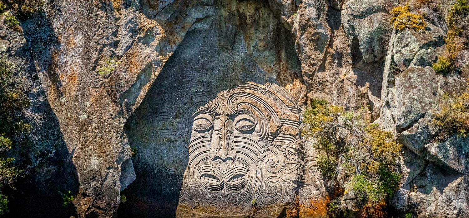 Maori Carving traditional rock carving lake taupo north island new zealand.