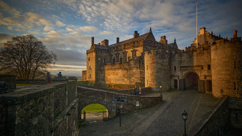 Sunset in entry of Stirling castle in Autumn with clouds in the background