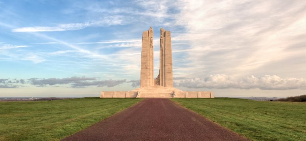Vimy Ridge Memorial - Canadian War Memorial - blue sky, striking memorial in field